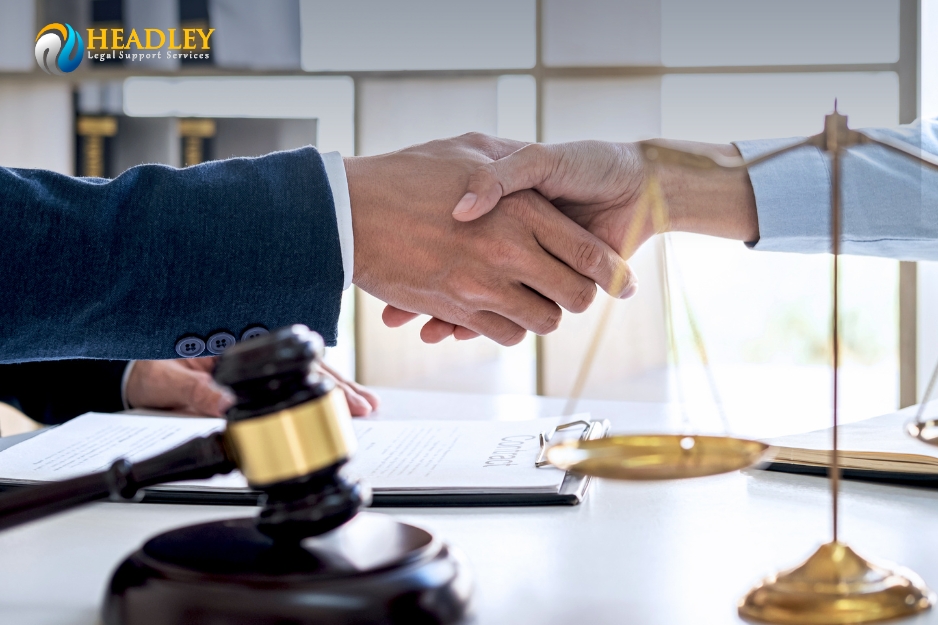 A handshake between a lawyer and a process server - Headley Legal Support Services Florida