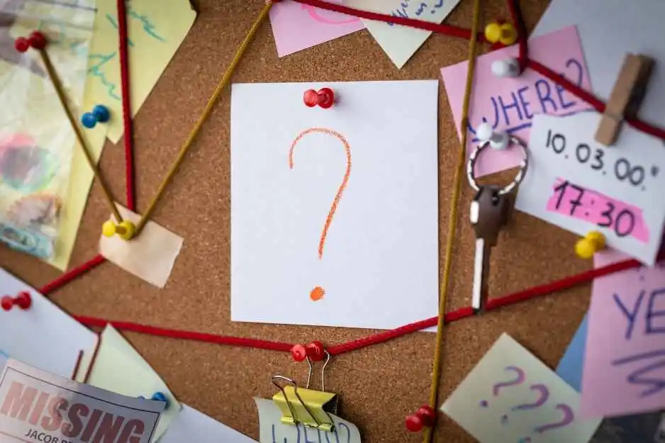 Mystery investigation concept with red strings connecting clues on a corkboard. - Headley Legal Support Services Florida
