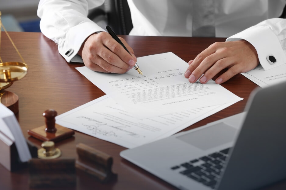 Notary public placing seal on official paperwork