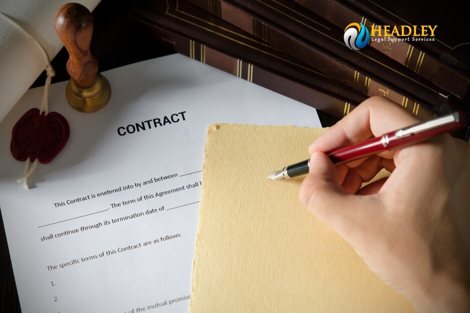 Close-up of contract signing for legal support services.