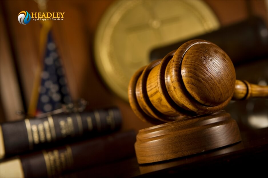 Legal justice symbol with gavel and law books.